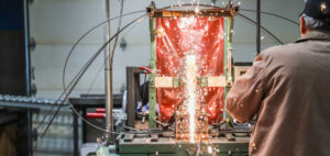 sparks flying at a green machine