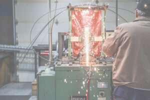 AMADA blades sparks flying at a green machine
