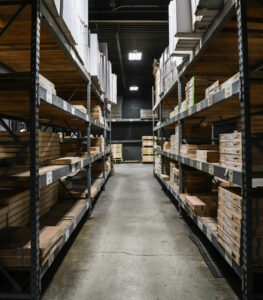 warehouse rows of industrial products piling shelves