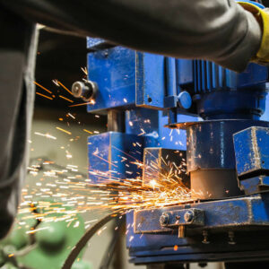 closeup of sparks flying at a machine